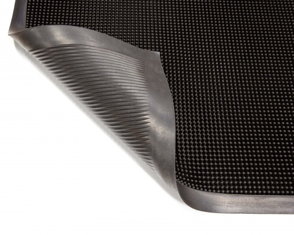 Gritstop Fingermat rubber entrance mat showing flexible corner and backing