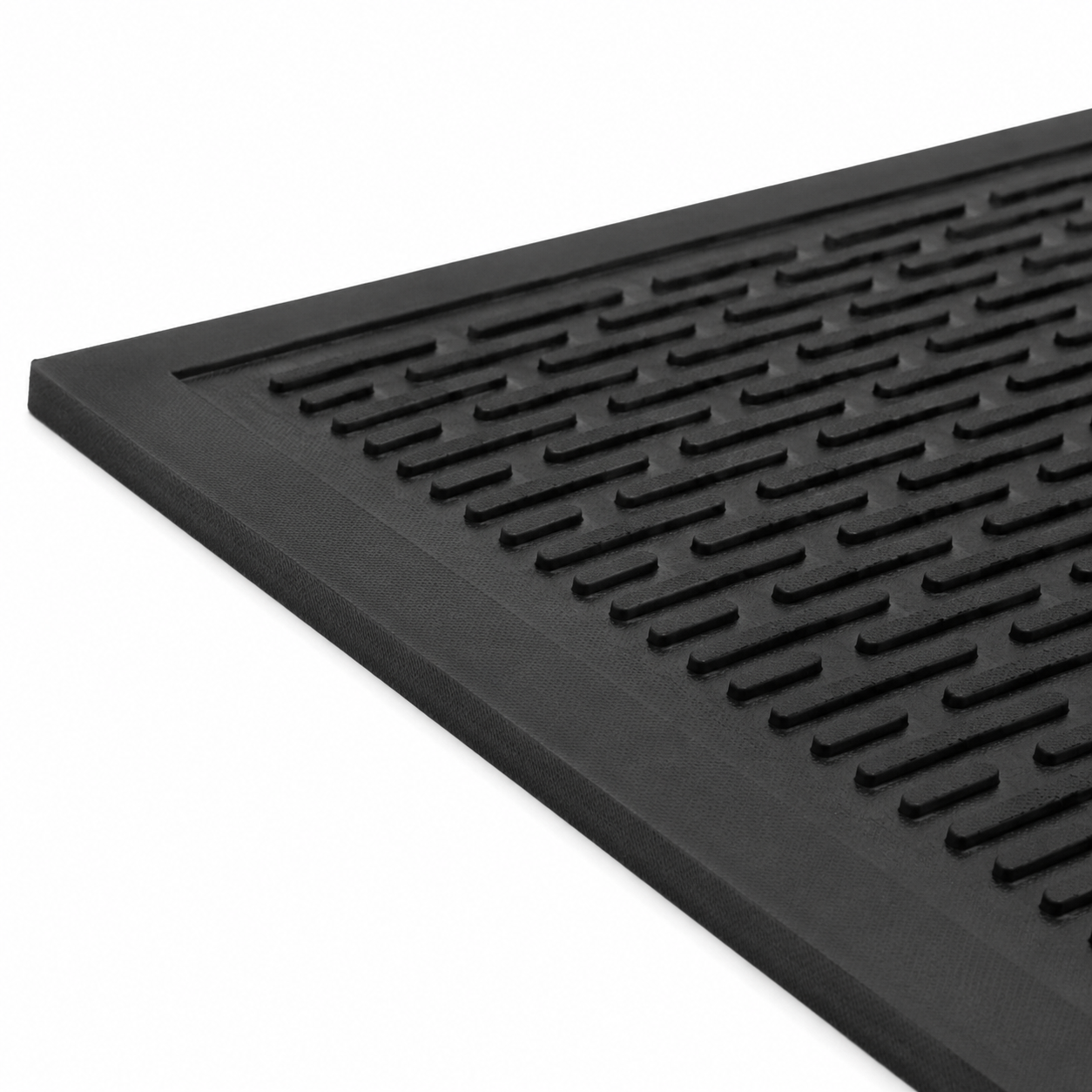 Close-up of the raised scraper bars, integrated border and low-profile edge