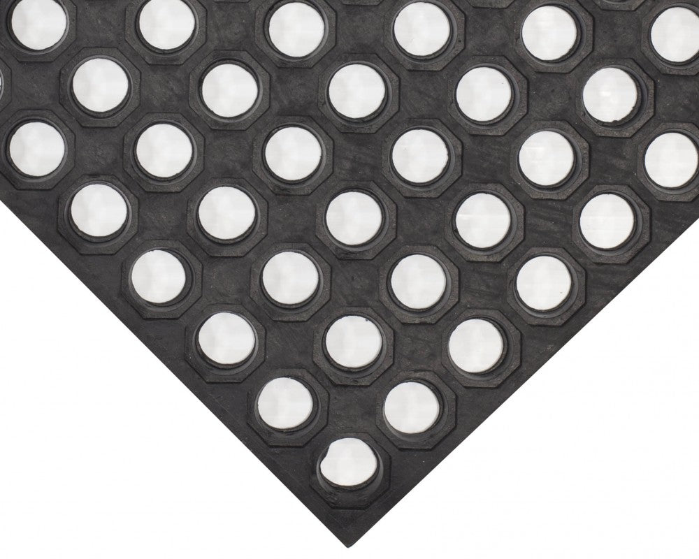 Close-up of Value Flex Open Top perforated rubber anti fatigue mat surface