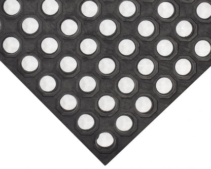 Close-up of Value Flex Open Top perforated rubber anti fatigue mat surface